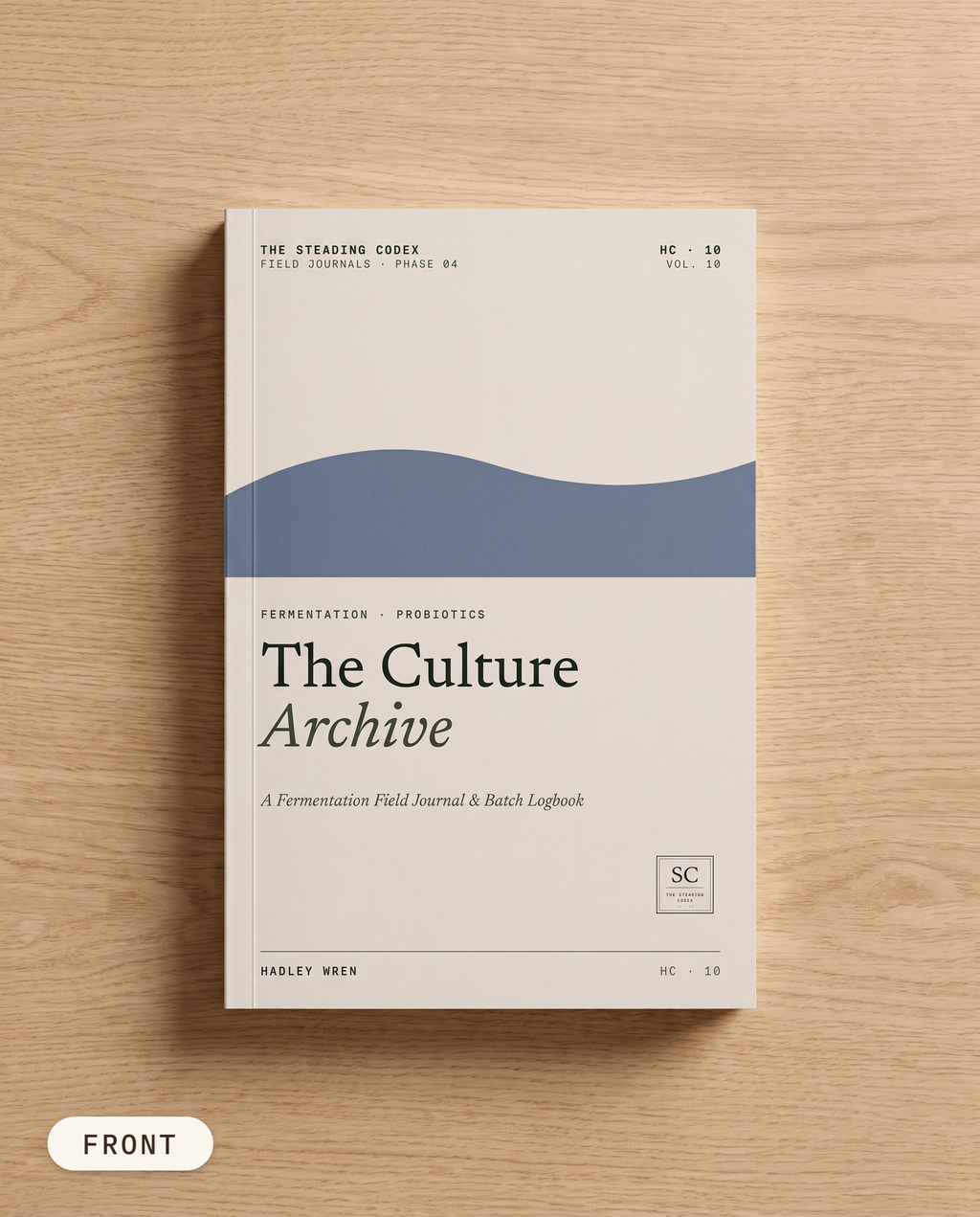 The Culture Archive fermentation journal — front cover on an oak table