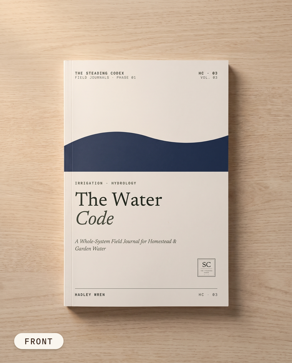 The Water Code homestead water journal — front cover on an oak table